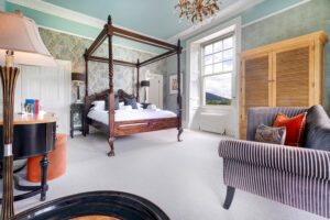 'Cat Bells' suite - ensuite king size bedroom with views across Derwentwater to Cat Bells.