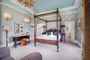 'Cat Bells' suite - ensuite king size bedroom with views across Derwentwater to Cat Bells.