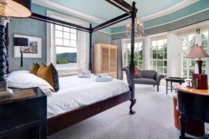'Cat Bells' suite - ensuite king size bedroom with views across Derwentwater to Cat Bells.