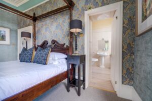 'Cat Bells' suite - ensuite king size bedroom with views across Derwentwater to Cat Bells.