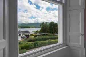 'Cat Bells' suite - ensuite king size bedroom with views across Derwentwater to Cat Bells.